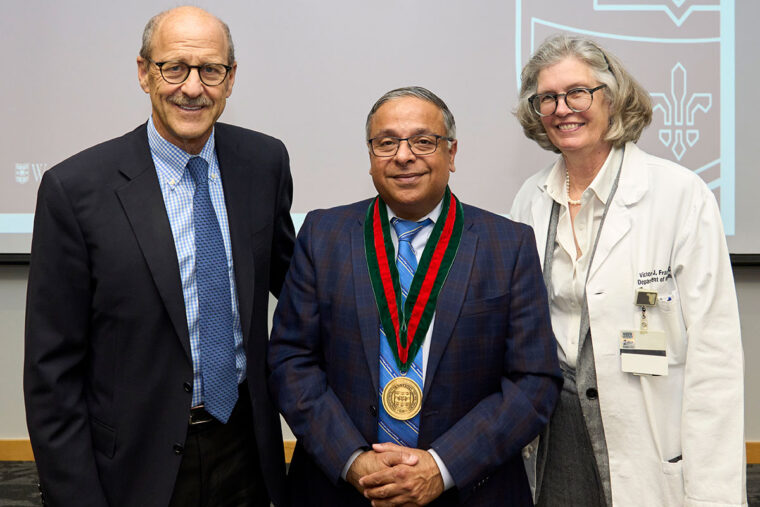 Abhinav Diwan, MD, at his installation, with Dean Perlmutter and Professor Victoria Fraser